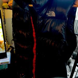 Athletic cut medium women’s Summit Series North Face down vest.